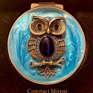 NIB Compact Mirror with both regular and magnifying.